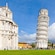 The Leaning Tower of Pisa beside a cathedral with people walking nearby